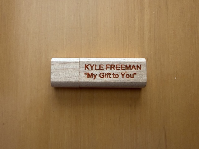 Wooden USB album product engraved with Kyle Freeman My Gift to You
